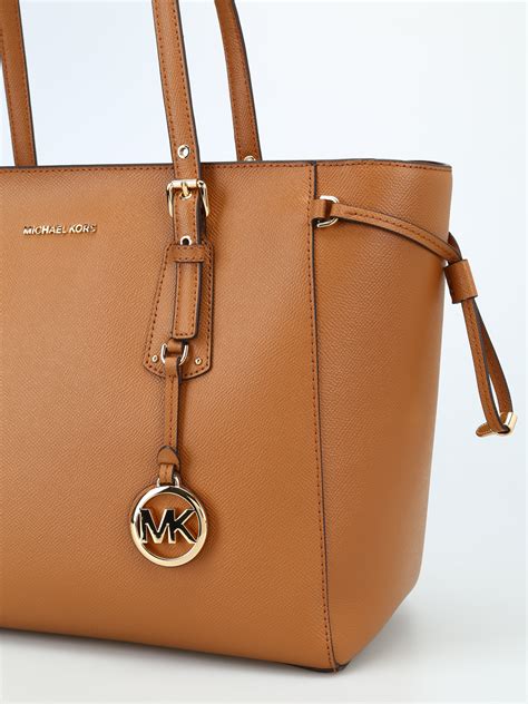 michael kors black and tan voyager|Michael Kors voyager bags.